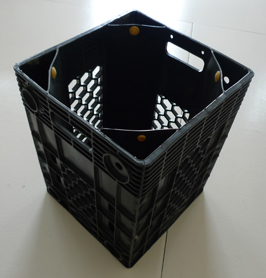 chici garbage can made from a bottled water crate
