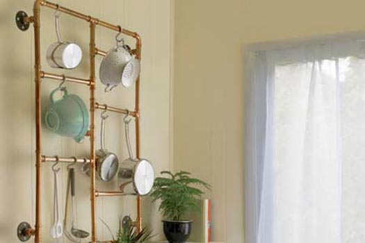 a pot rack made from copper tubing