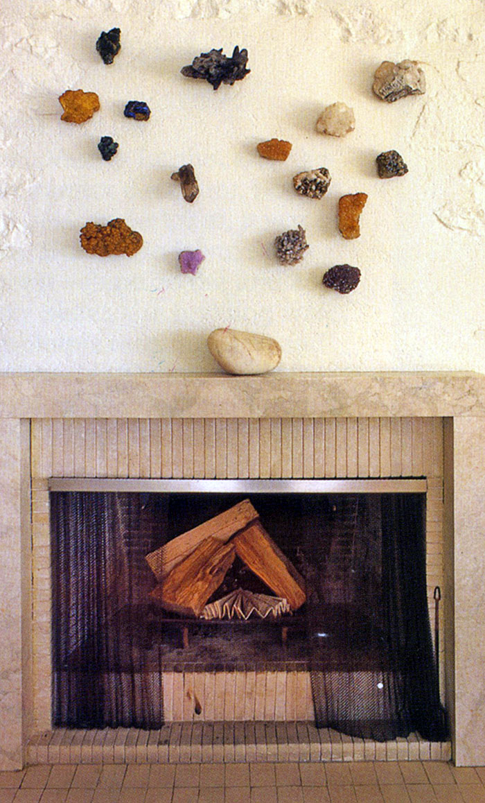 fossils, stones, geodes decorating a fireplace
