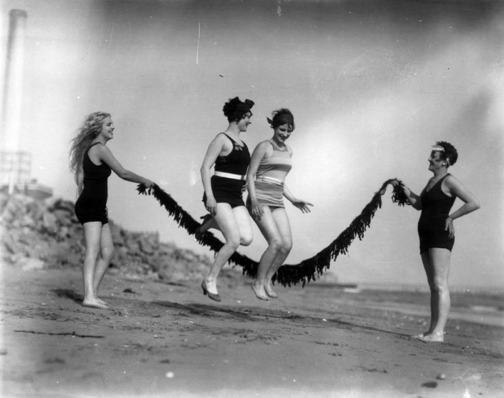 Girls jumping rope with seaweed, circa 1928